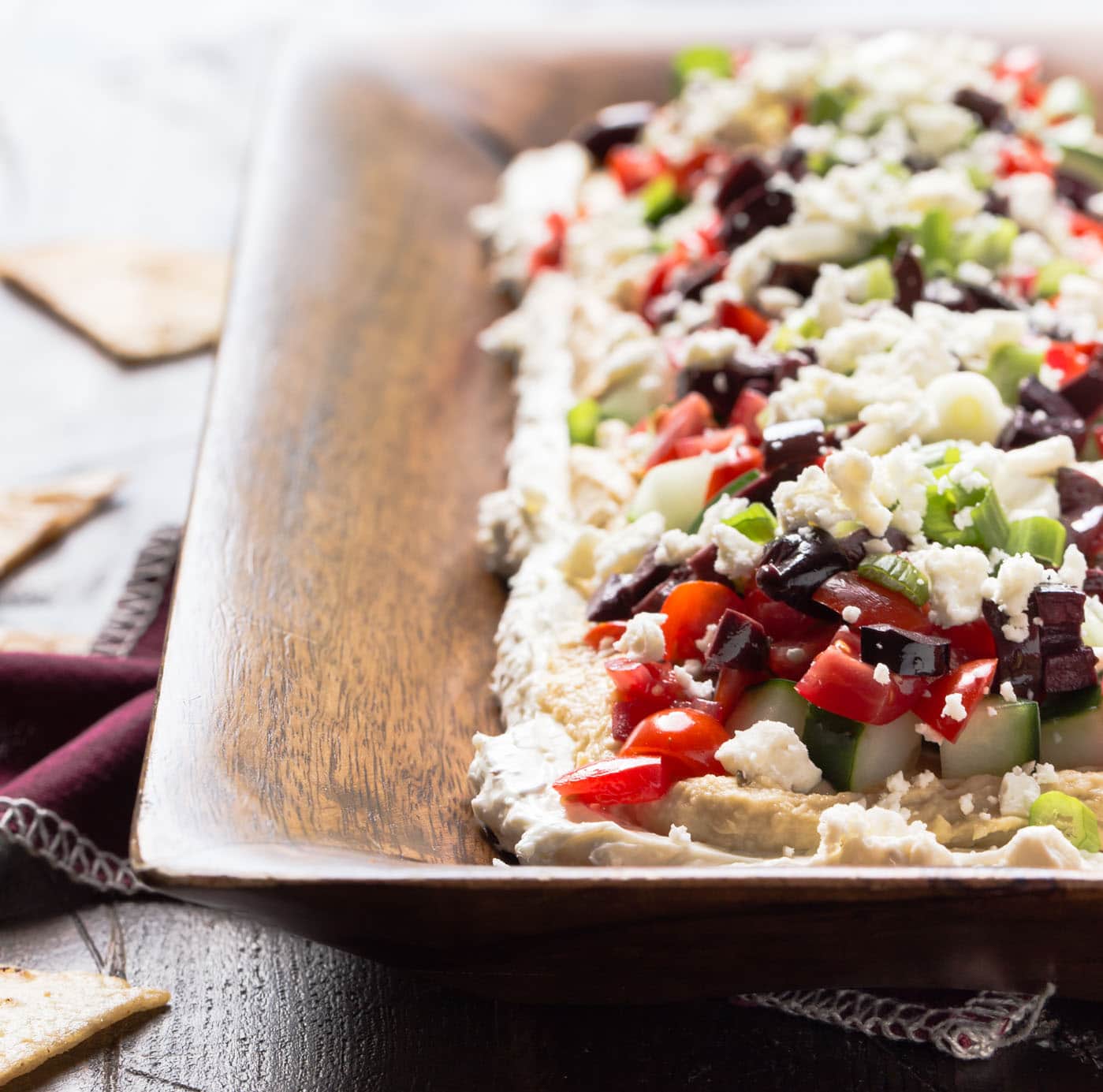 Layered Greek Dip - Garnish with Lemon