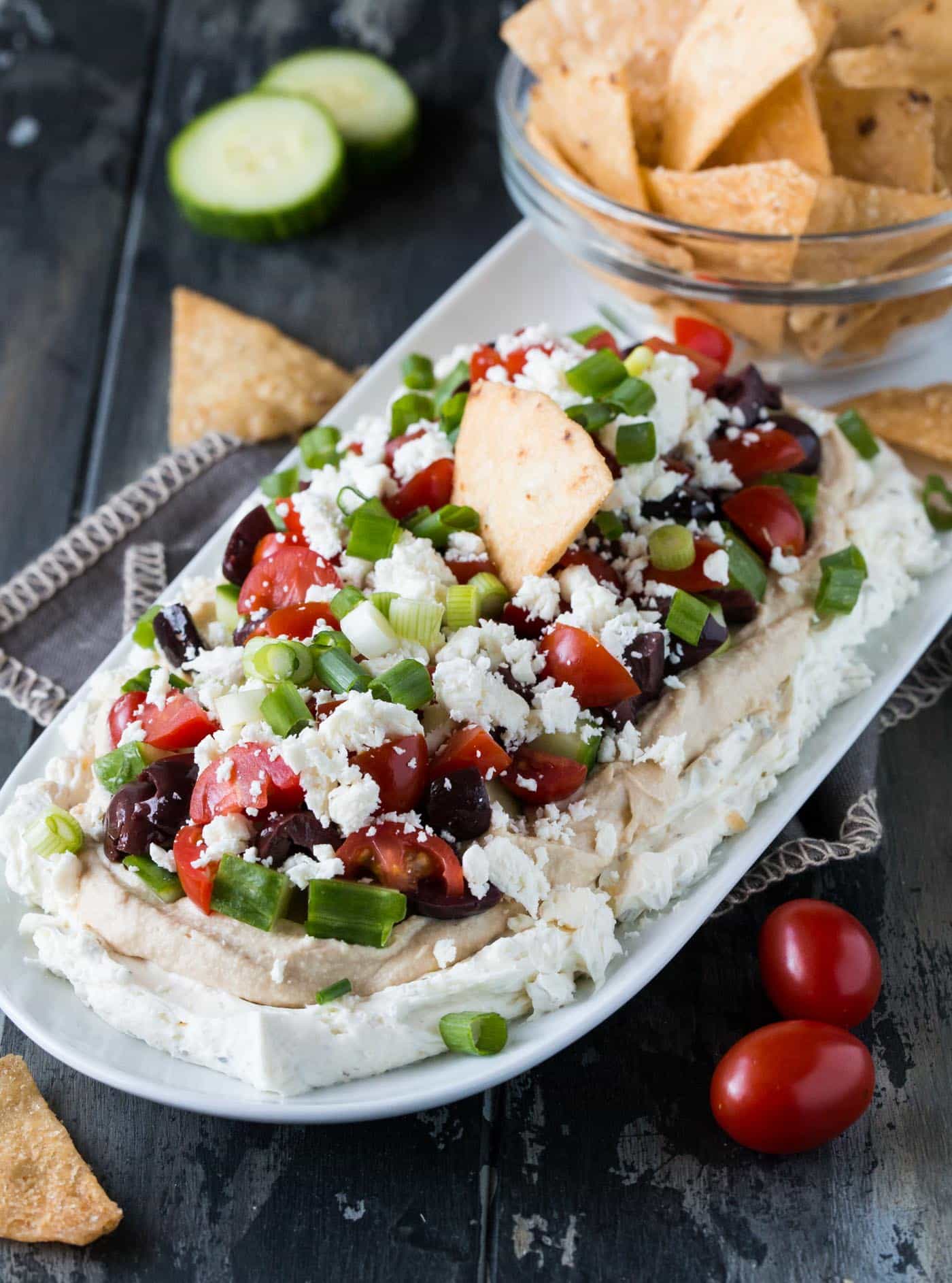 Layered Greek Dip A Mediterranean 7 Layer Dip Garnish With Lemon