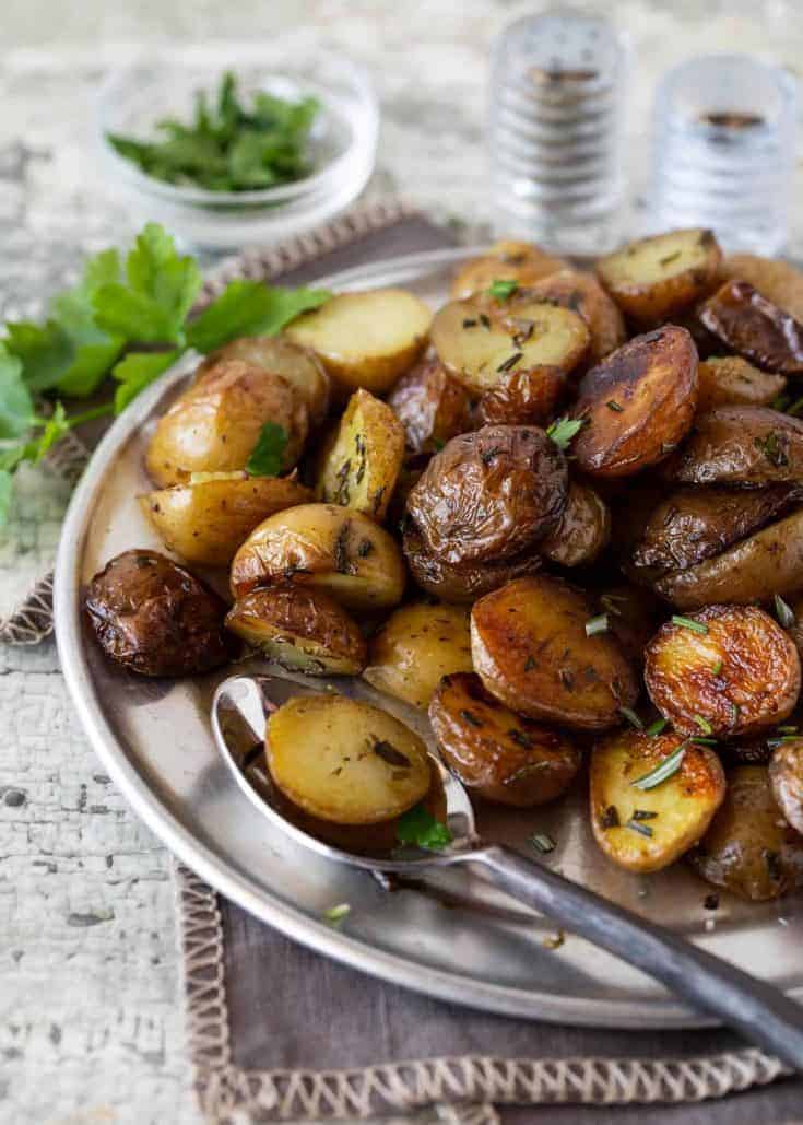 Herbed Grilled Potatoes in Foil  Garnish with Lemon