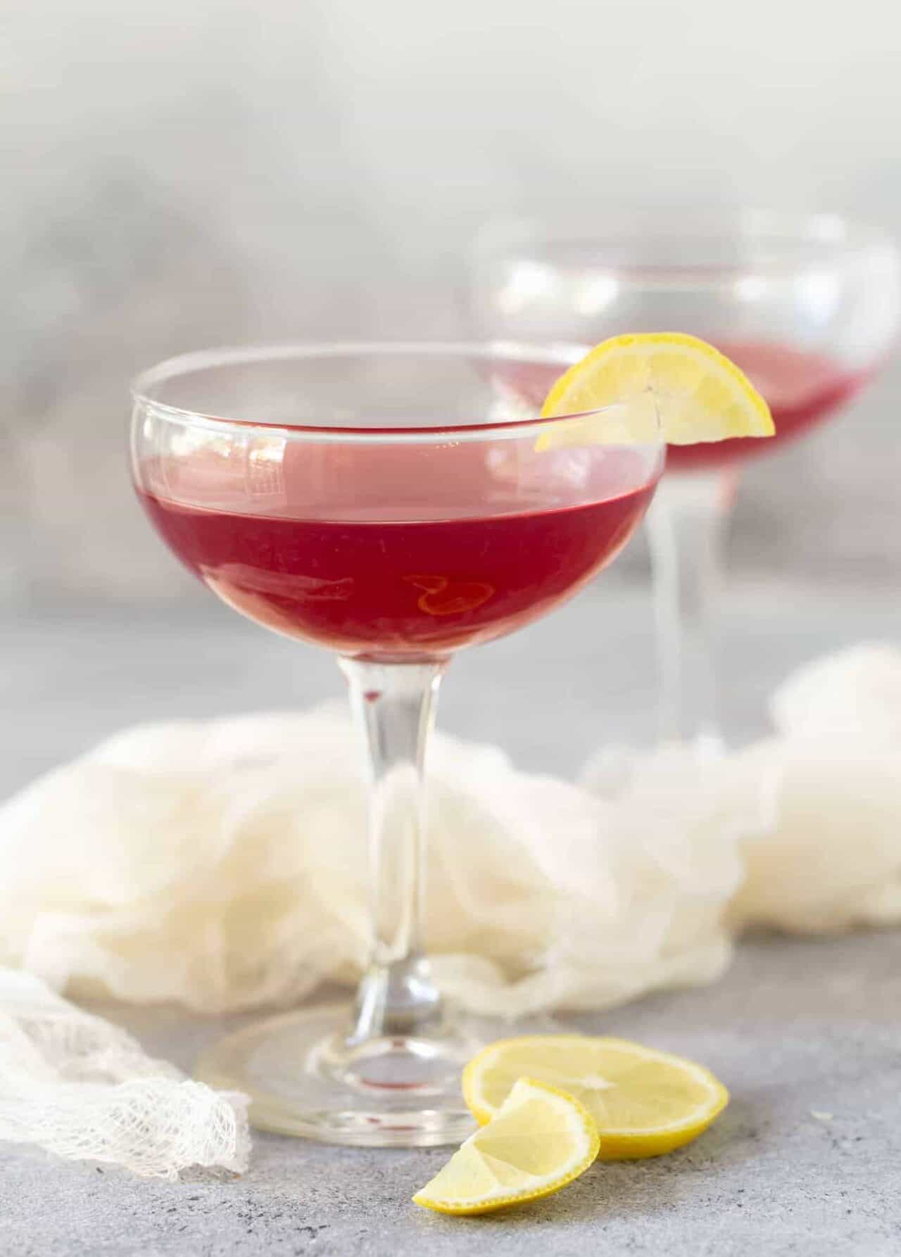 Pomegranate Gin Cocktails - Garnish with Lemon