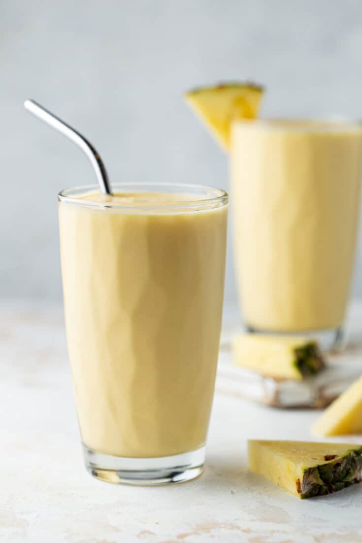 Easy Mango Pineapple Smoothie W Coconut Milk Garnish With Lemon