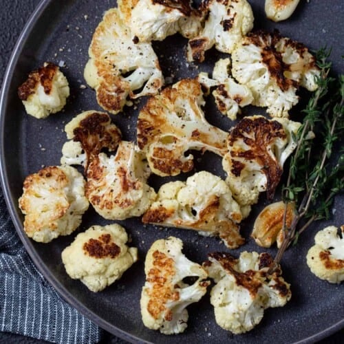 Easy Oven Roasted Cauliflower (only 4 ingredients!)- Garnish with Lemon