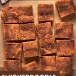 Snickerdoodle bars cut into squares.