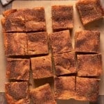 Cinnamon Sugar butter blondies on parchment paper.