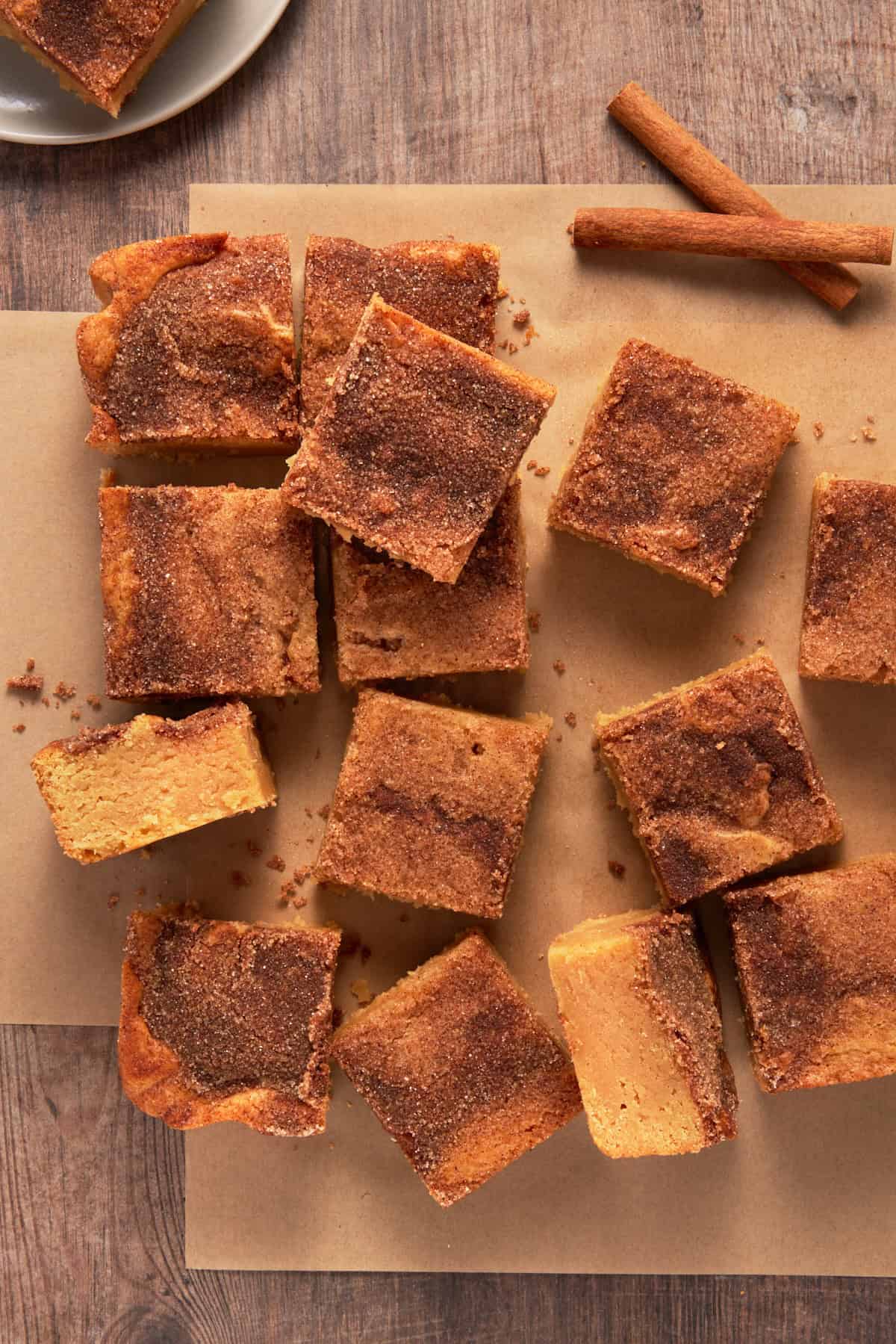 Cut Snickerdoodle bars with some on the side to see the texture.